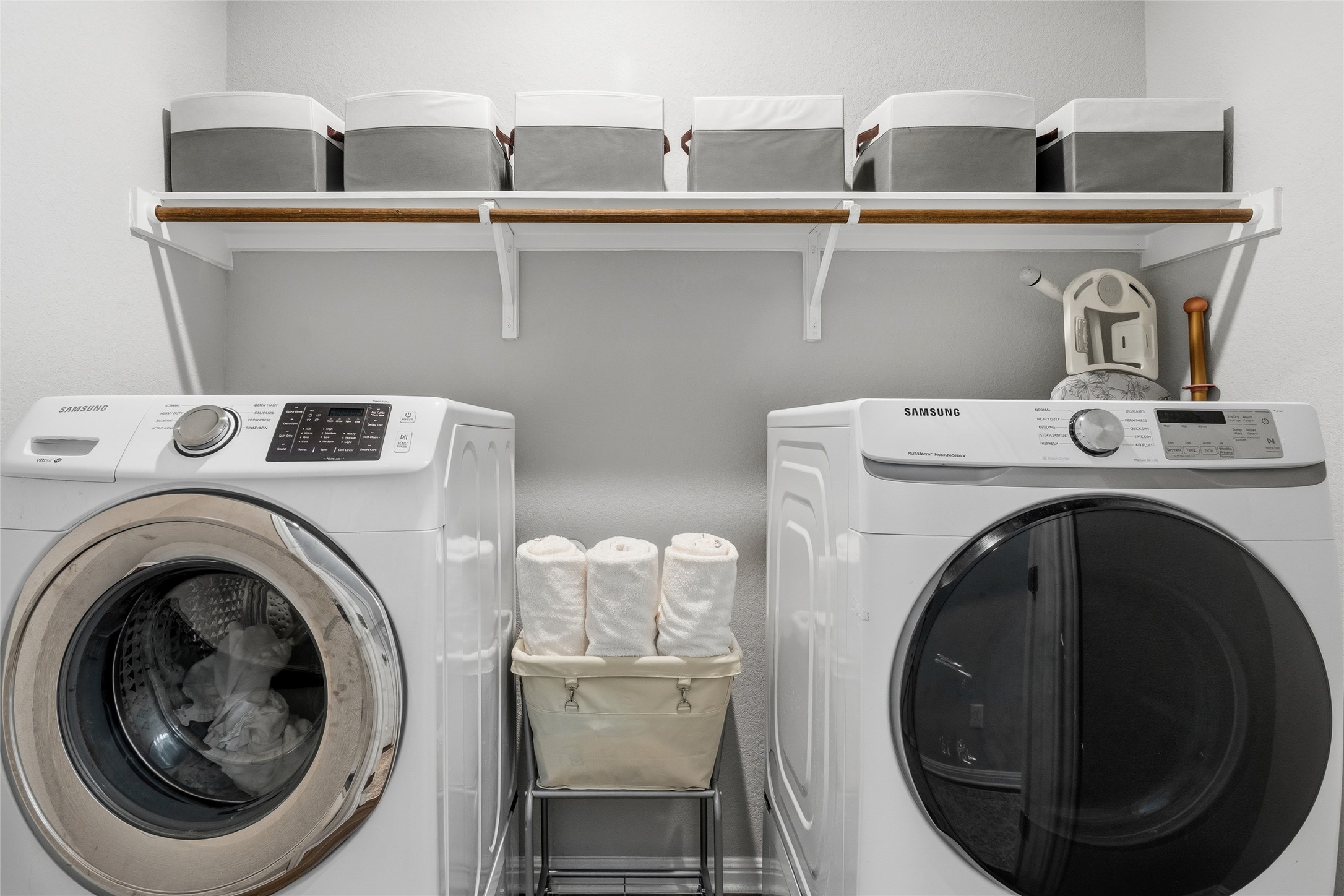 145 Beach Mountain Road Dripping Springs, TX 78620 - Photo 27 of 40 The laundry area offers ideal storage space.