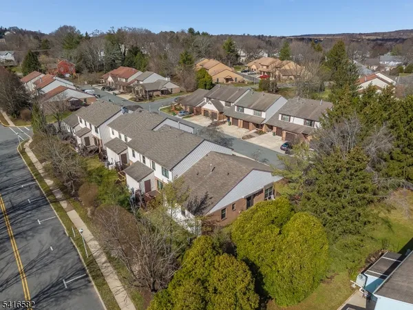 an aerial view of residential house with outdoor space