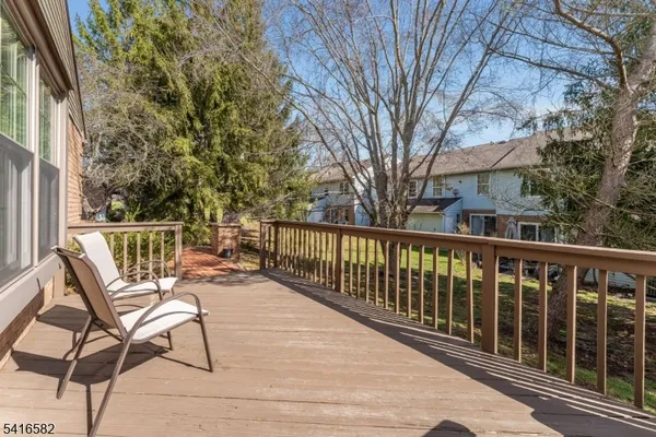 a view of a chairs on a roof deck