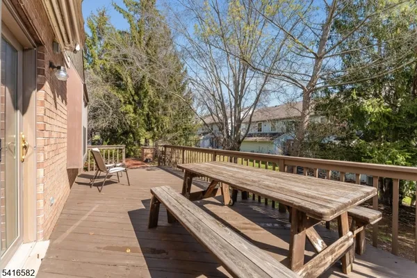 a view of a balcony with chairs