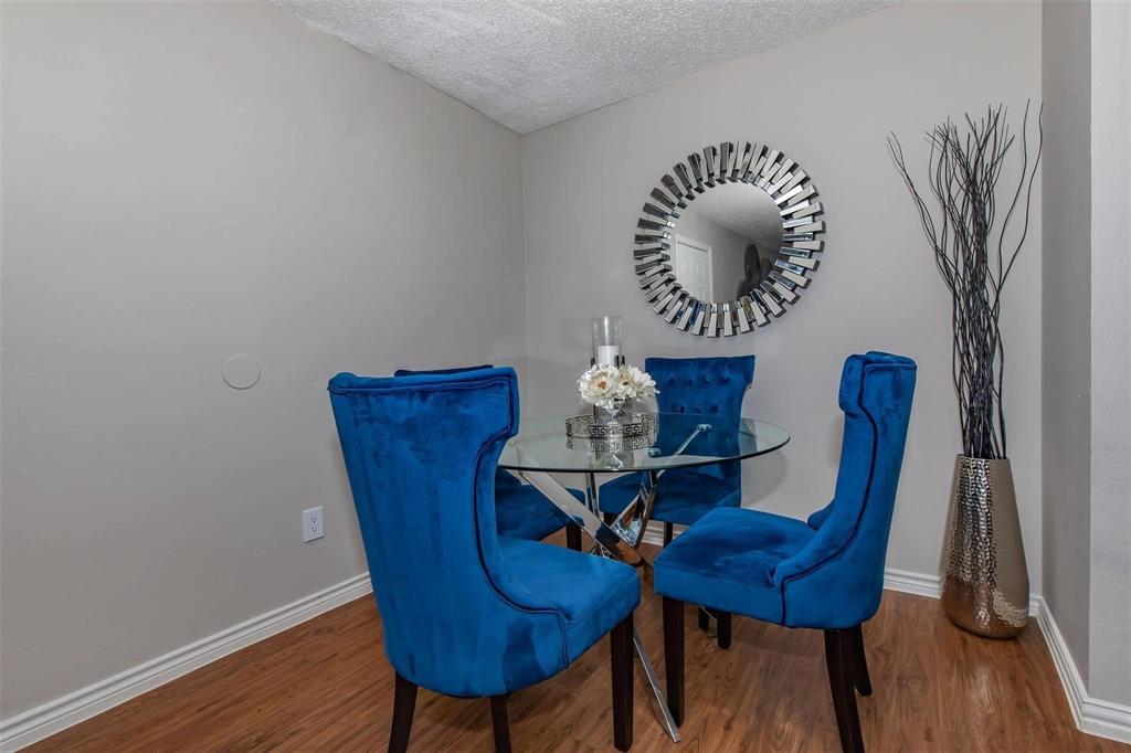 1826 Esters Road, Unit 1050 Irving, TX 75061 - Photo 9 of 39 Wood-finish flooring with light-toned walls