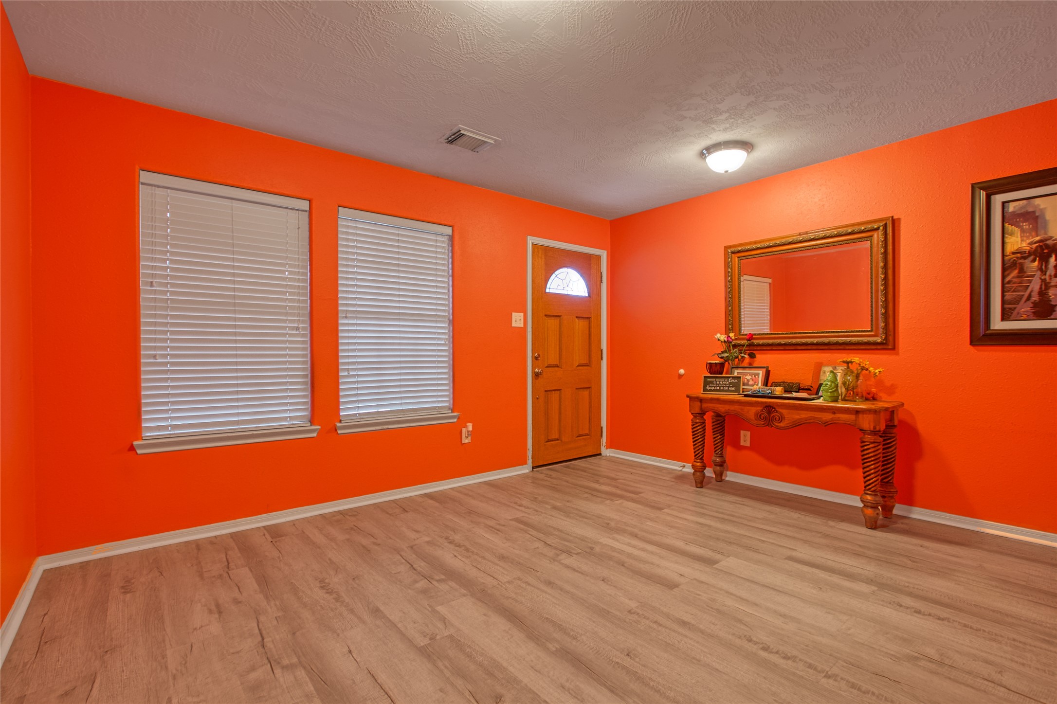 6702 Northridge Trace Lane Spring, TX 77379 - Photo 8 of 30 a view of an empty room with a window and wooden floor