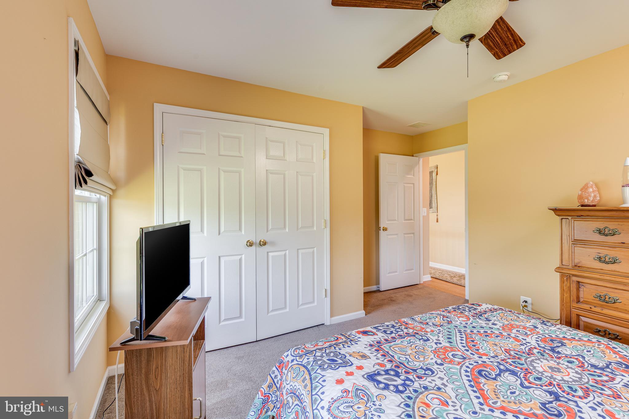 2 Dellaira Court Wrightstown, NJ 08562 - Photo 53 of 93 a bedroom with a bed and flat screen tv