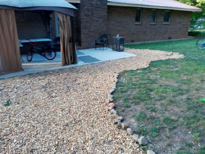 281 Myers Road Winchester, TN 37398 - Photo 24 of 31 a view of a backyard with a patio door and an outdoor