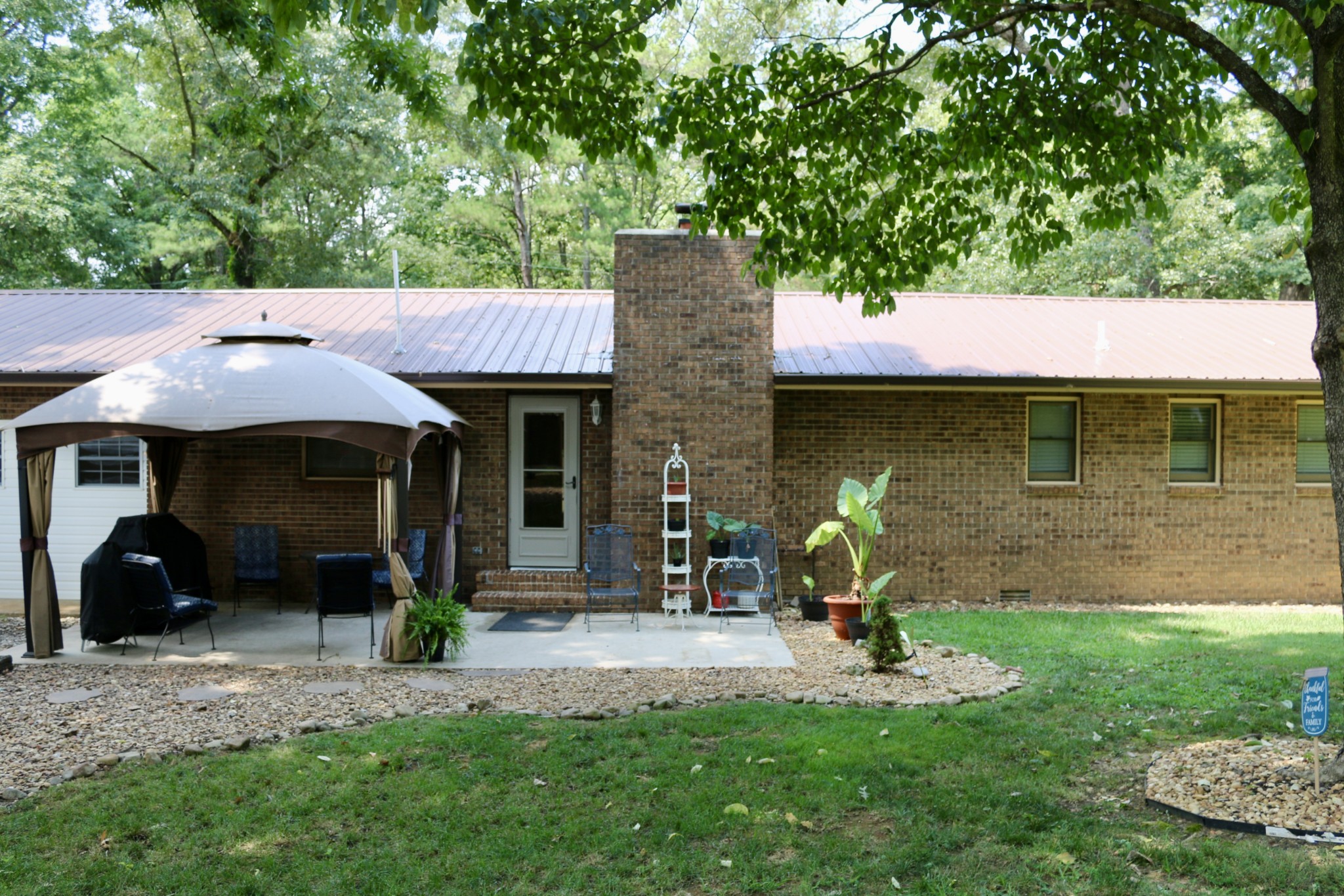 281 Myers Road Winchester, TN 37398 - Photo 30 of 31 a view of a chair and table in backyard of the house