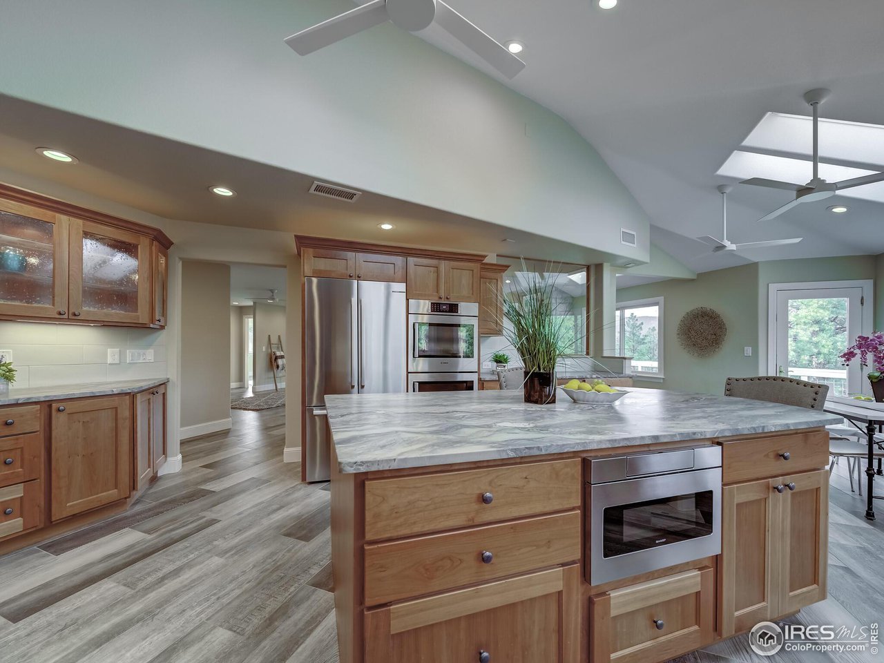 5634 Longmont Dam Road Lyons, CO 80540 - Photo 12 of 34 a kitchen with a counter space cabinets and appliances
