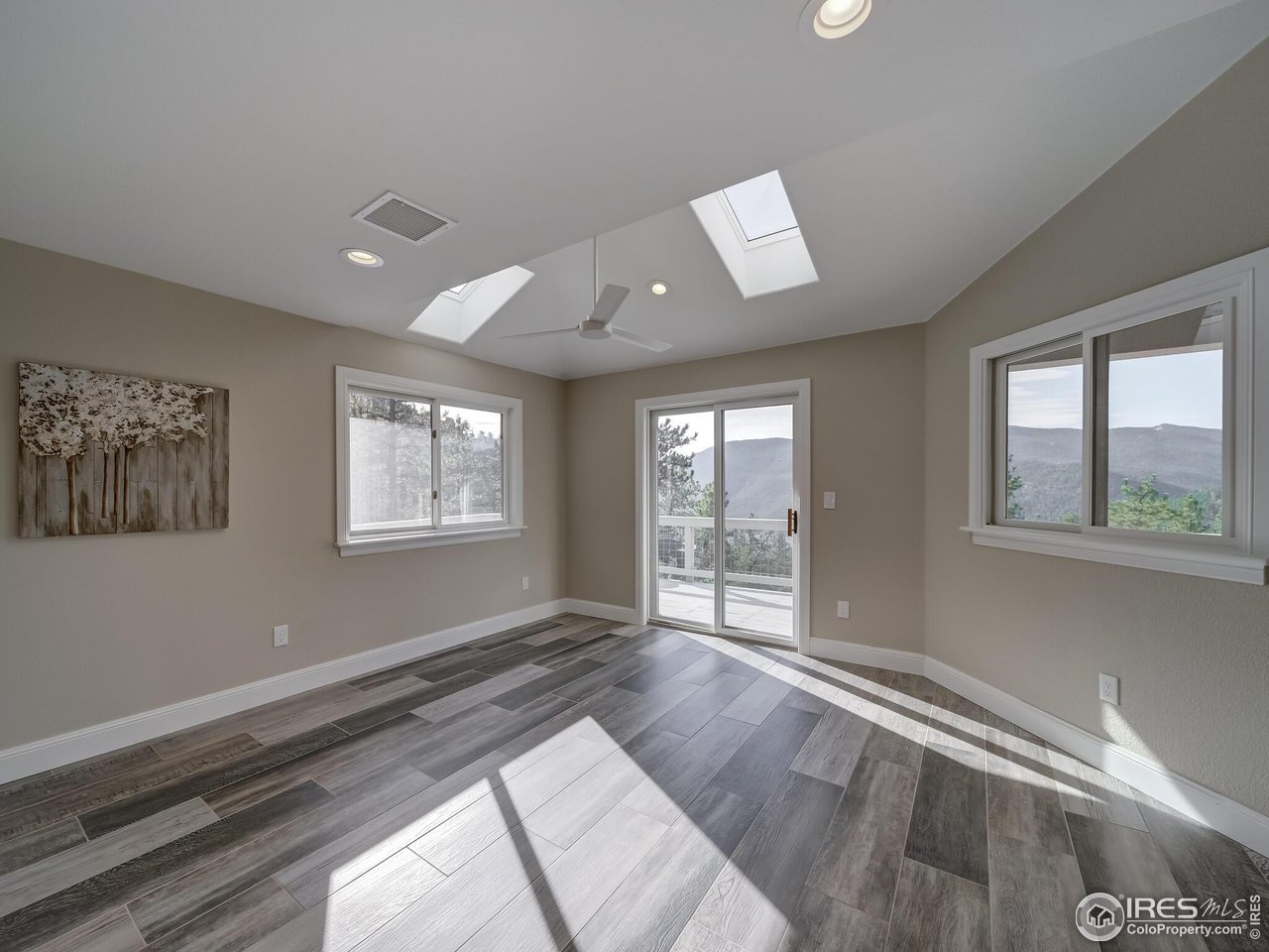 5634 Longmont Dam Road Lyons, CO 80540 - Photo 18 of 34 a view of an empty room with a window