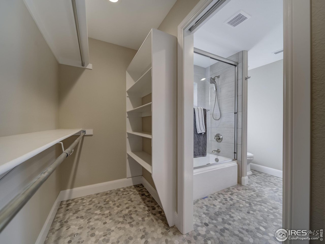 5634 Longmont Dam Road Lyons, CO 80540 - Photo 21 of 34 a bathroom with a sink a toilet and shower