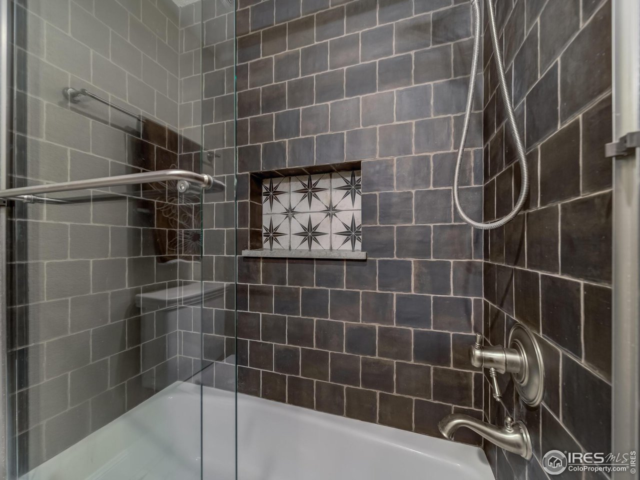 5634 Longmont Dam Road Lyons, CO 80540 - Photo 23 of 34 a bathroom with a shower