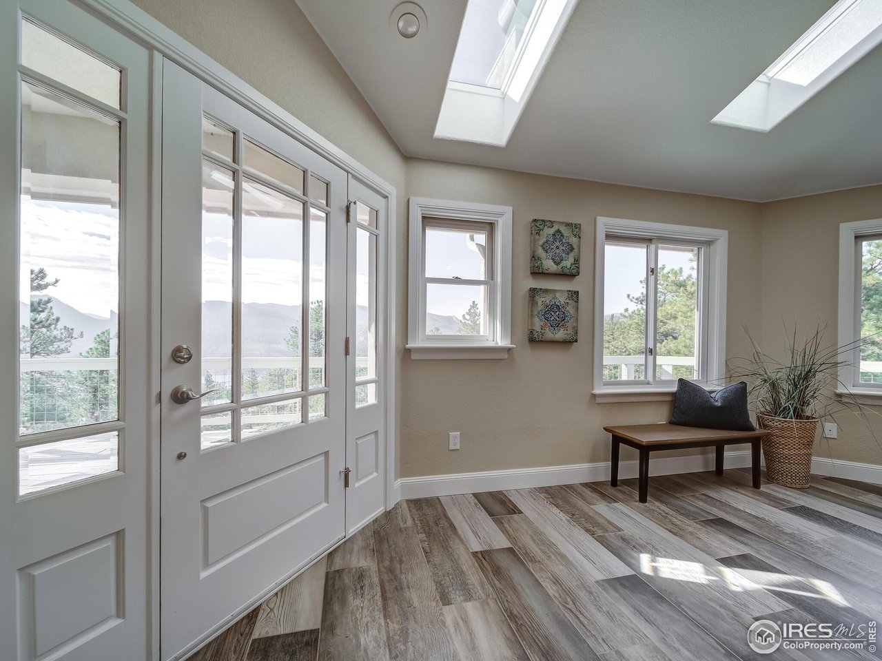5634 Longmont Dam Road Lyons, CO 80540 - Photo 3 of 34 a view of a livingroom with furniture and a window