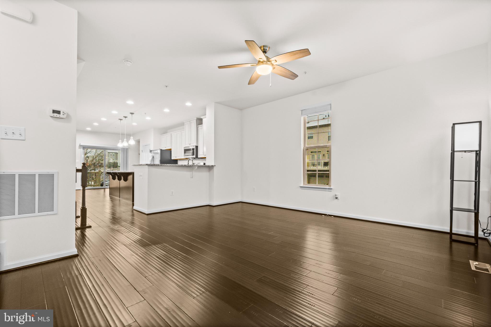 7839 Patterson Way Hanover, MD 21076 - Photo 11 of 56 a view of a kitchen with wooden floor and a kitchen