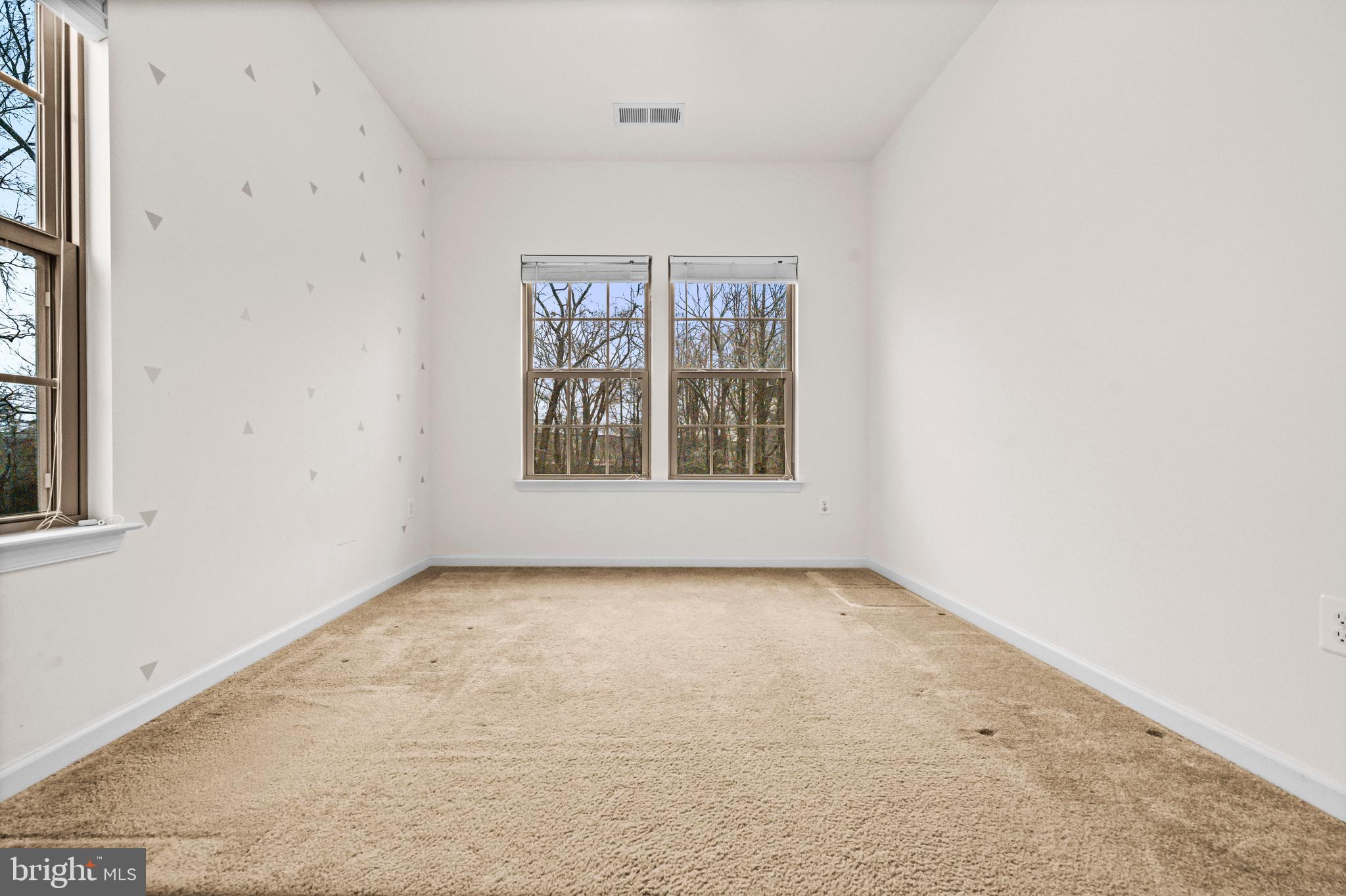 7839 Patterson Way Hanover, MD 21076 - Photo 25 of 56 an empty room with windows