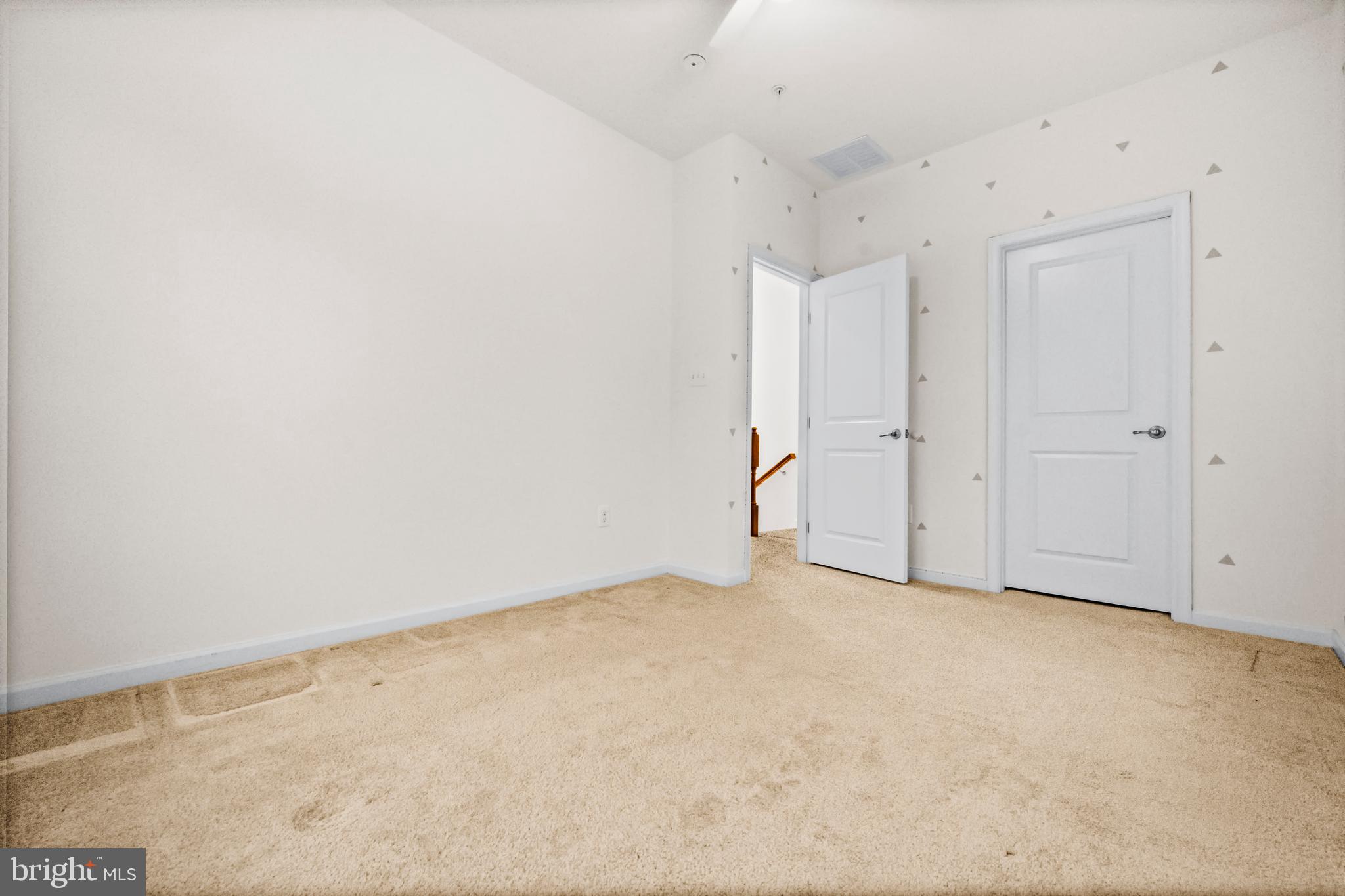 7839 Patterson Way Hanover, MD 21076 - Photo 27 of 56 an empty room with an entryway