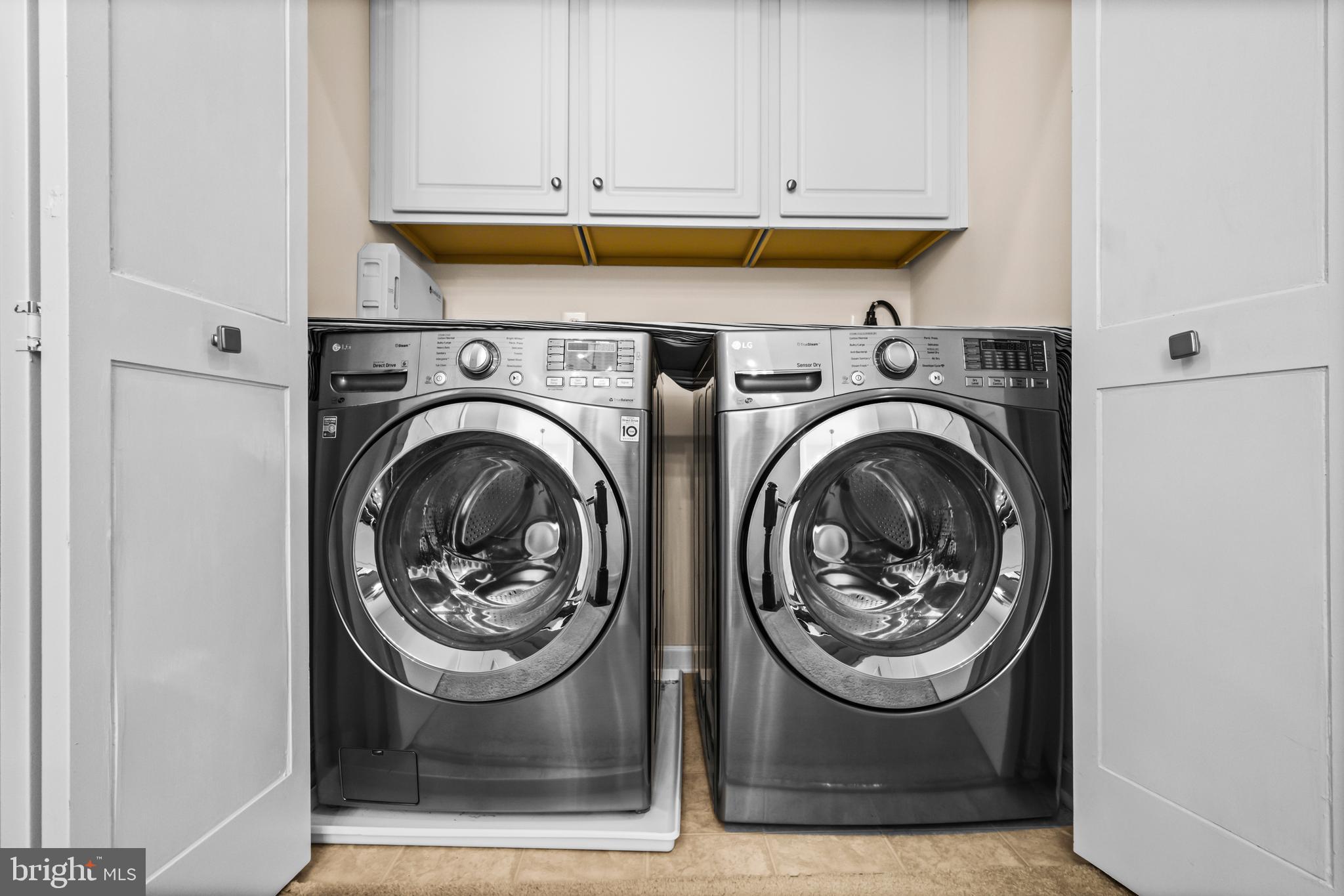 7839 Patterson Way Hanover, MD 21076 - Photo 29 of 56 a view of washer and dryer in a utility room
