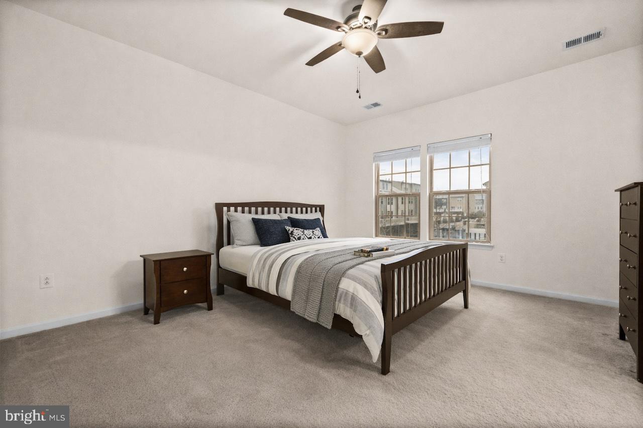 7839 Patterson Way Hanover, MD 21076 - Photo 30 of 56 a bedroom with a bed and window