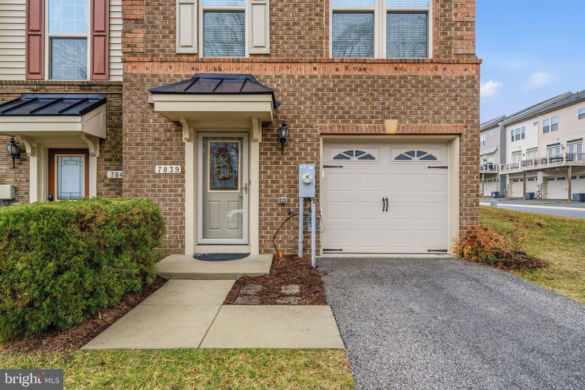 7839 Patterson Way Hanover, MD 21076 - Photo 3 of 56 a front view of a house