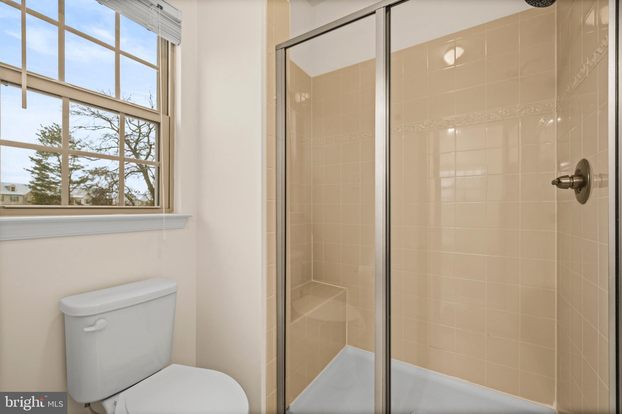 7839 Patterson Way Hanover, MD 21076 - Photo 33 of 56 a bathroom with a toilet and a shower