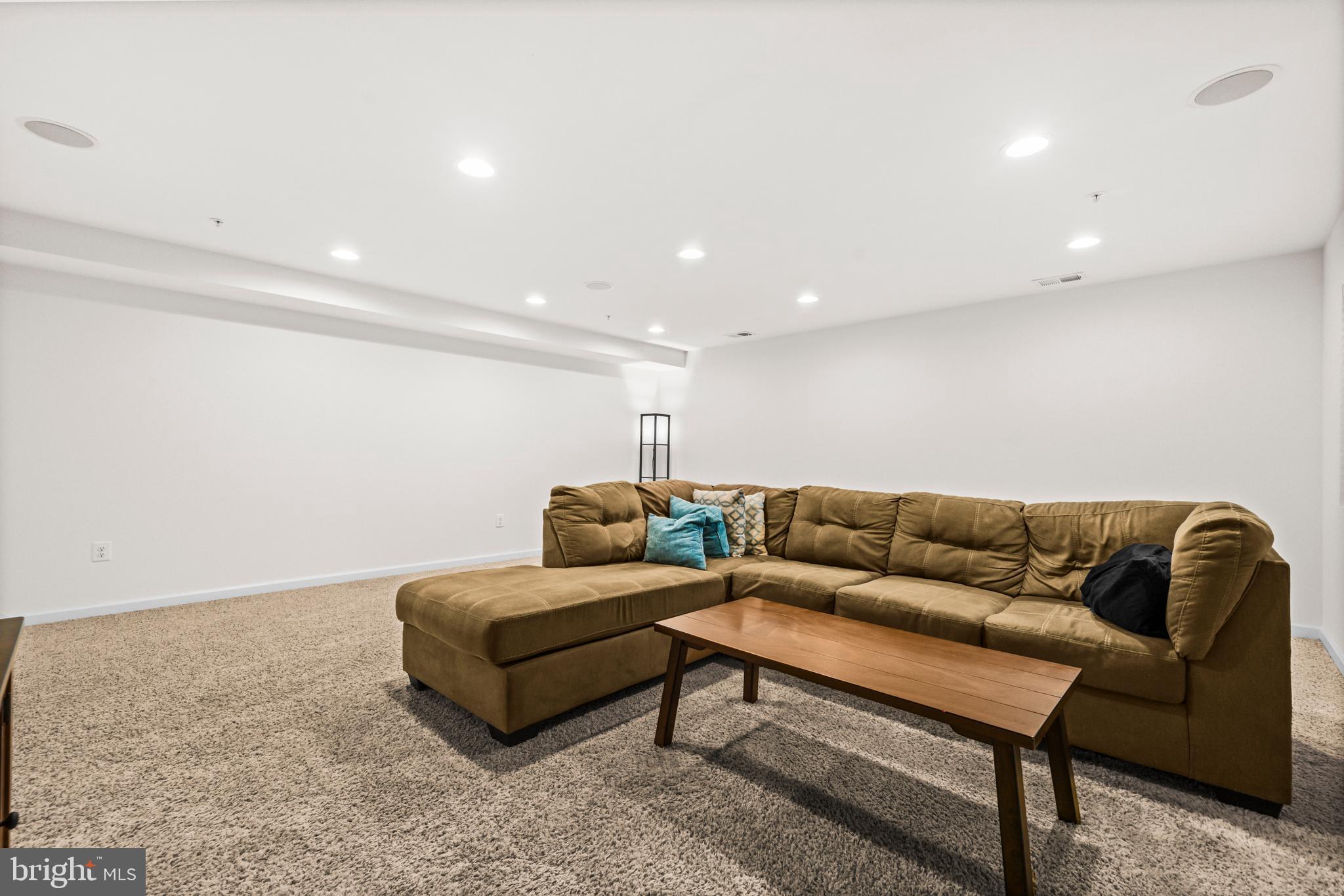 7839 Patterson Way Hanover, MD 21076 - Photo 36 of 56 a living room with furniture and a couch