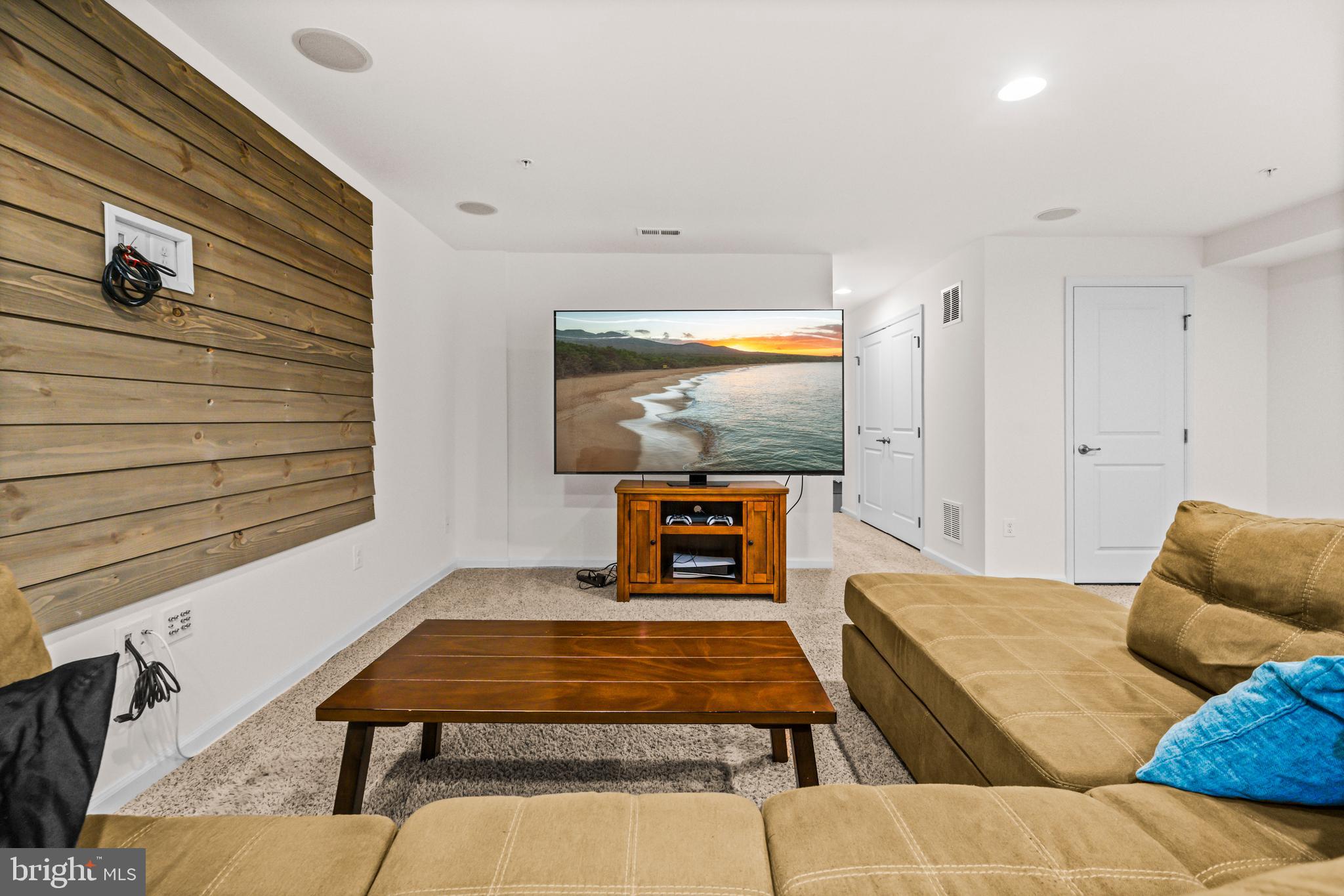 7839 Patterson Way Hanover, MD 21076 - Photo 39 of 56 a living room with furniture and a flat screen tv