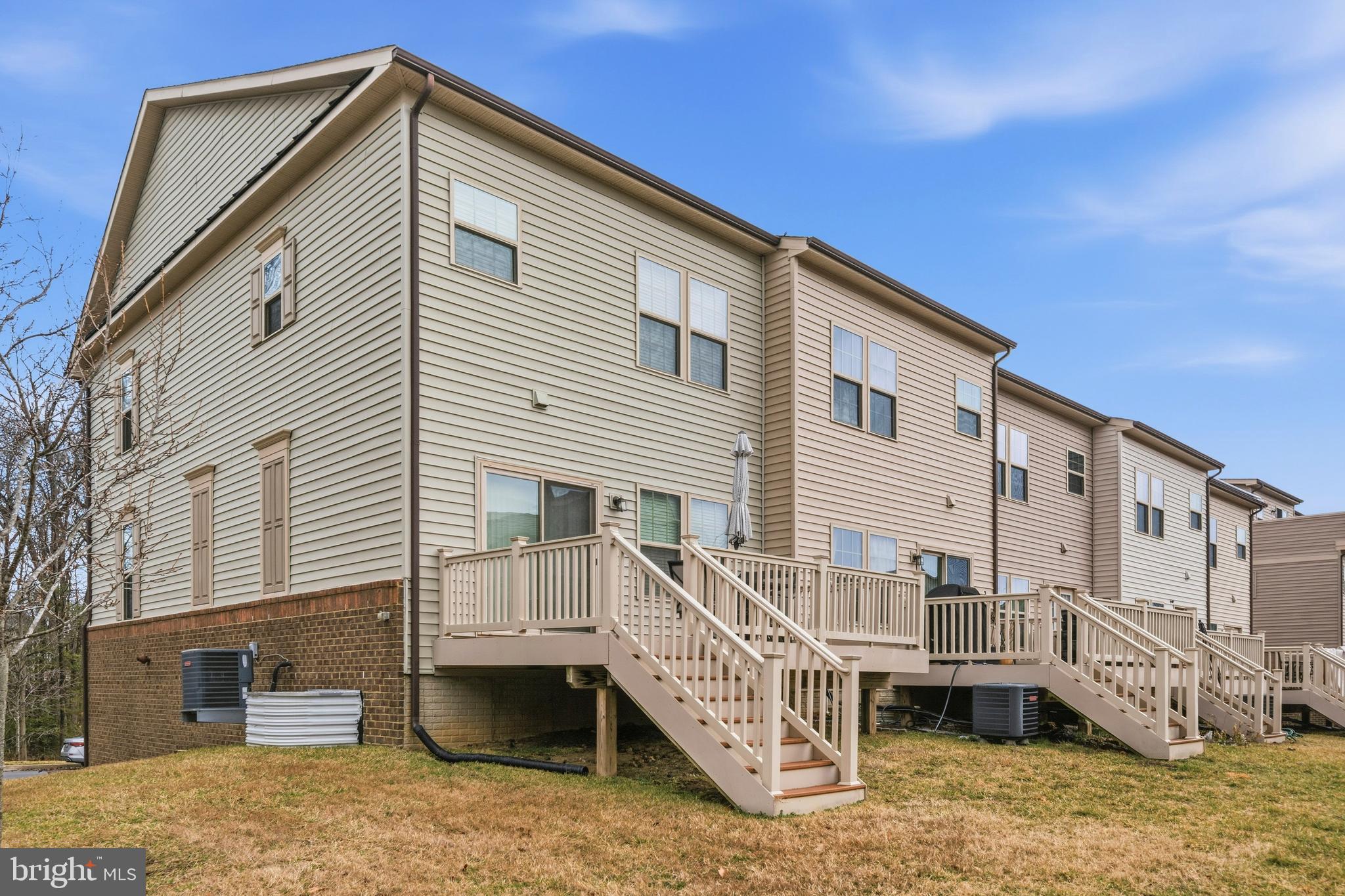 7839 Patterson Way Hanover, MD 21076 - Photo 44 of 56 a view of a house with a yard