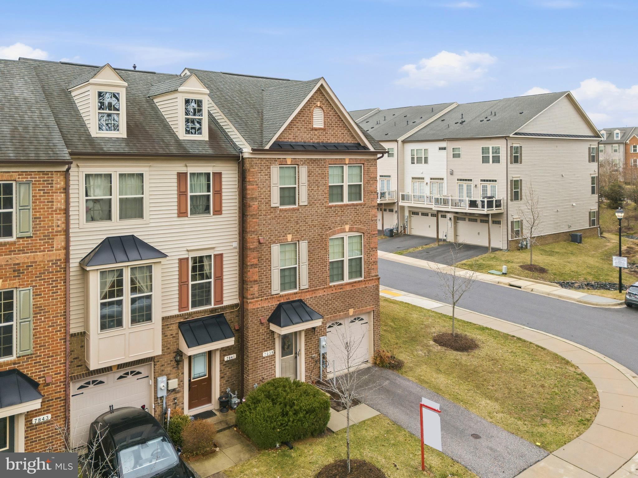 7839 Patterson Way Hanover, MD 21076 - Photo 47 of 56 a front view of a residential houses with yard