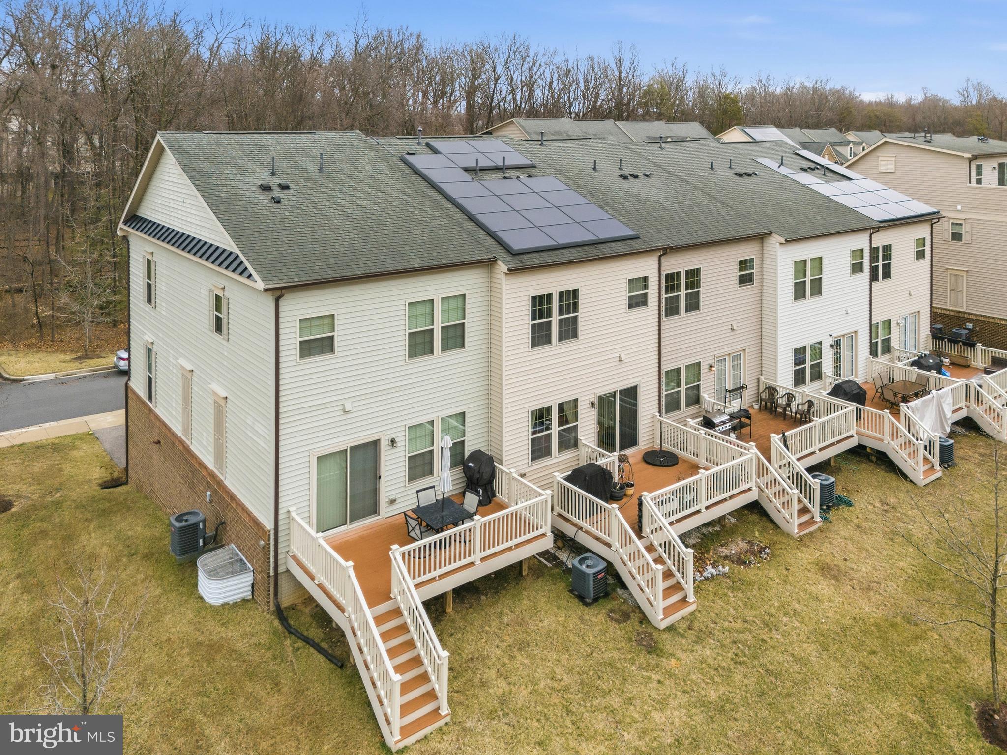 7839 Patterson Way Hanover, MD 21076 - Photo 50 of 56 a aerial view of a house with swimming pool and sitting area