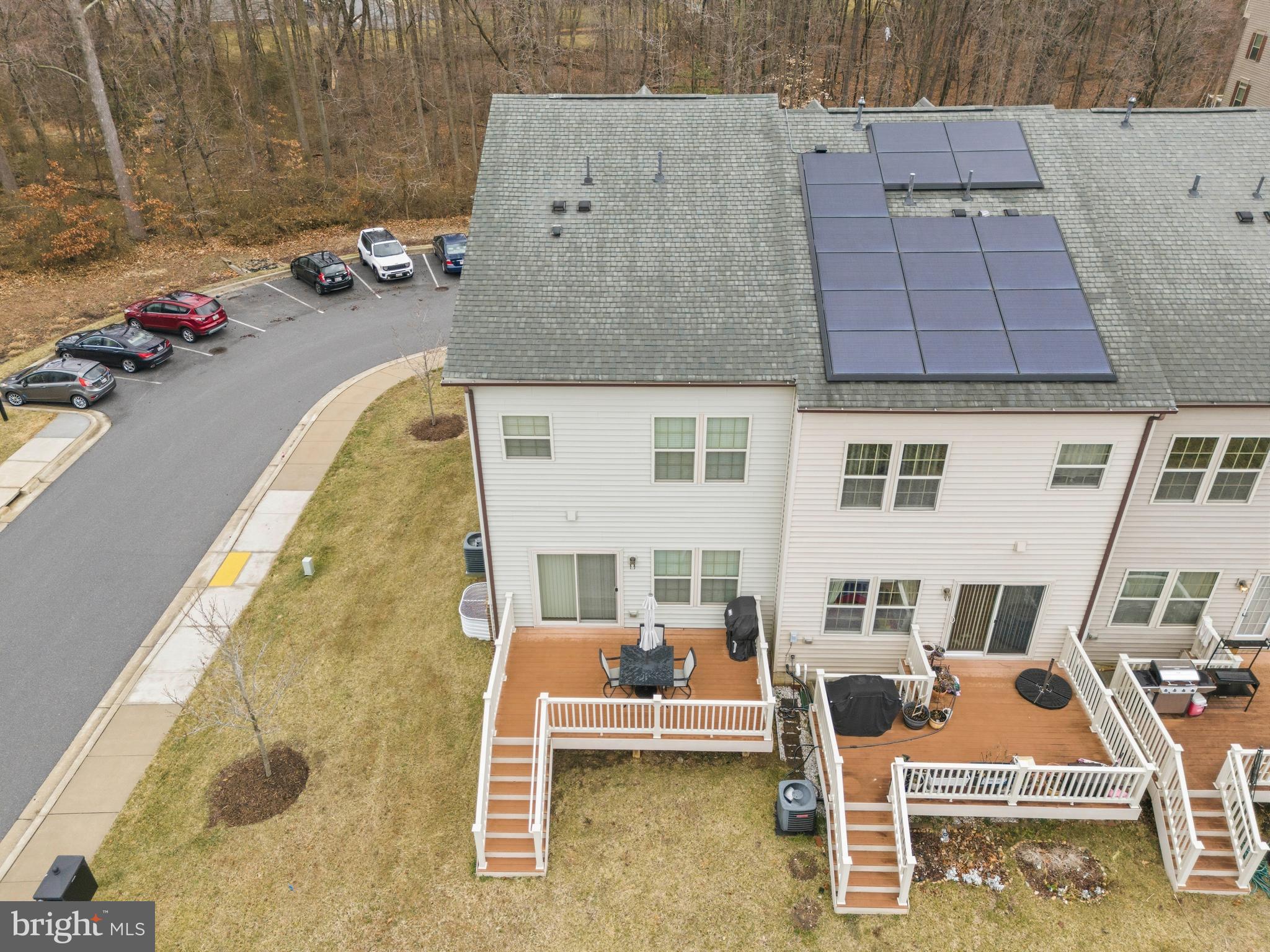 7839 Patterson Way Hanover, MD 21076 - Photo 52 of 56 an aerial view of a house with swimming pool