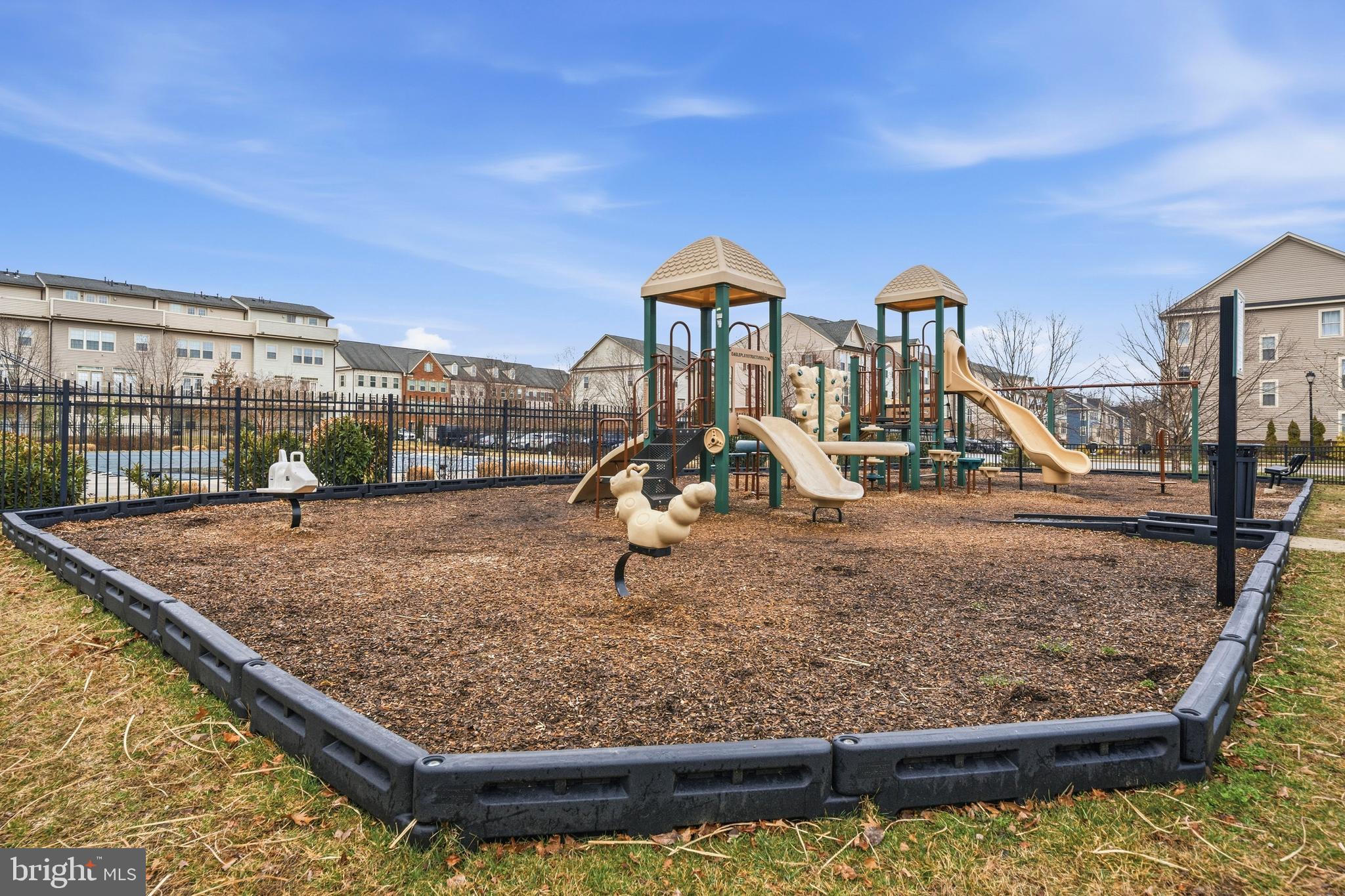 7839 Patterson Way Hanover, MD 21076 - Photo 55 of 56 a view of a swimming pool with a patio and a yard