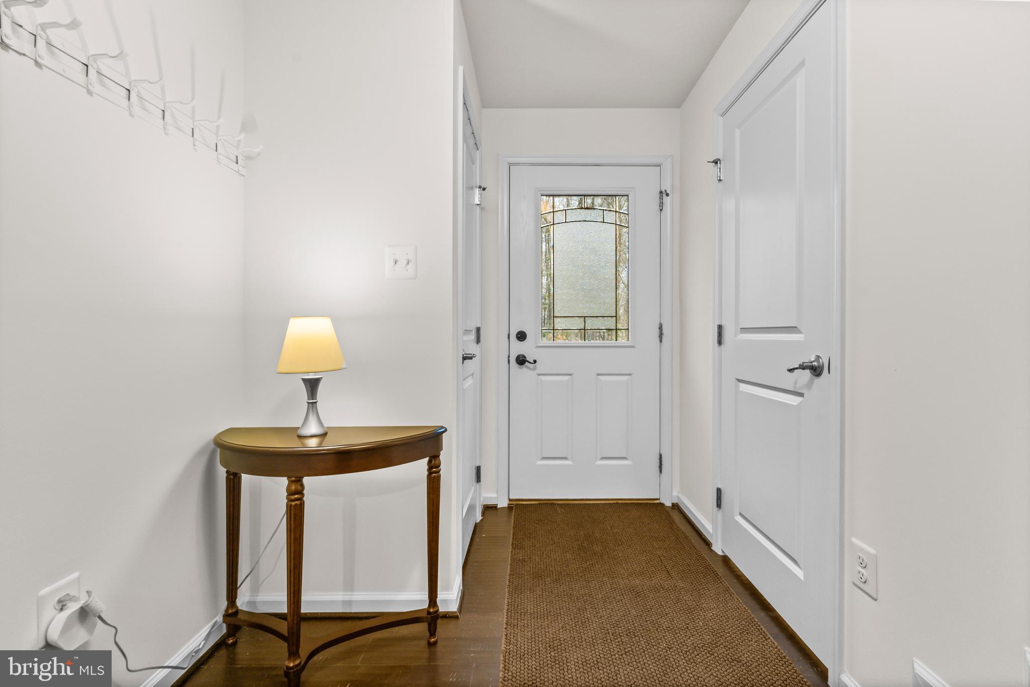 7839 Patterson Way Hanover, MD 21076 - Photo 7 of 56 a bathroom with a sink and a mirror