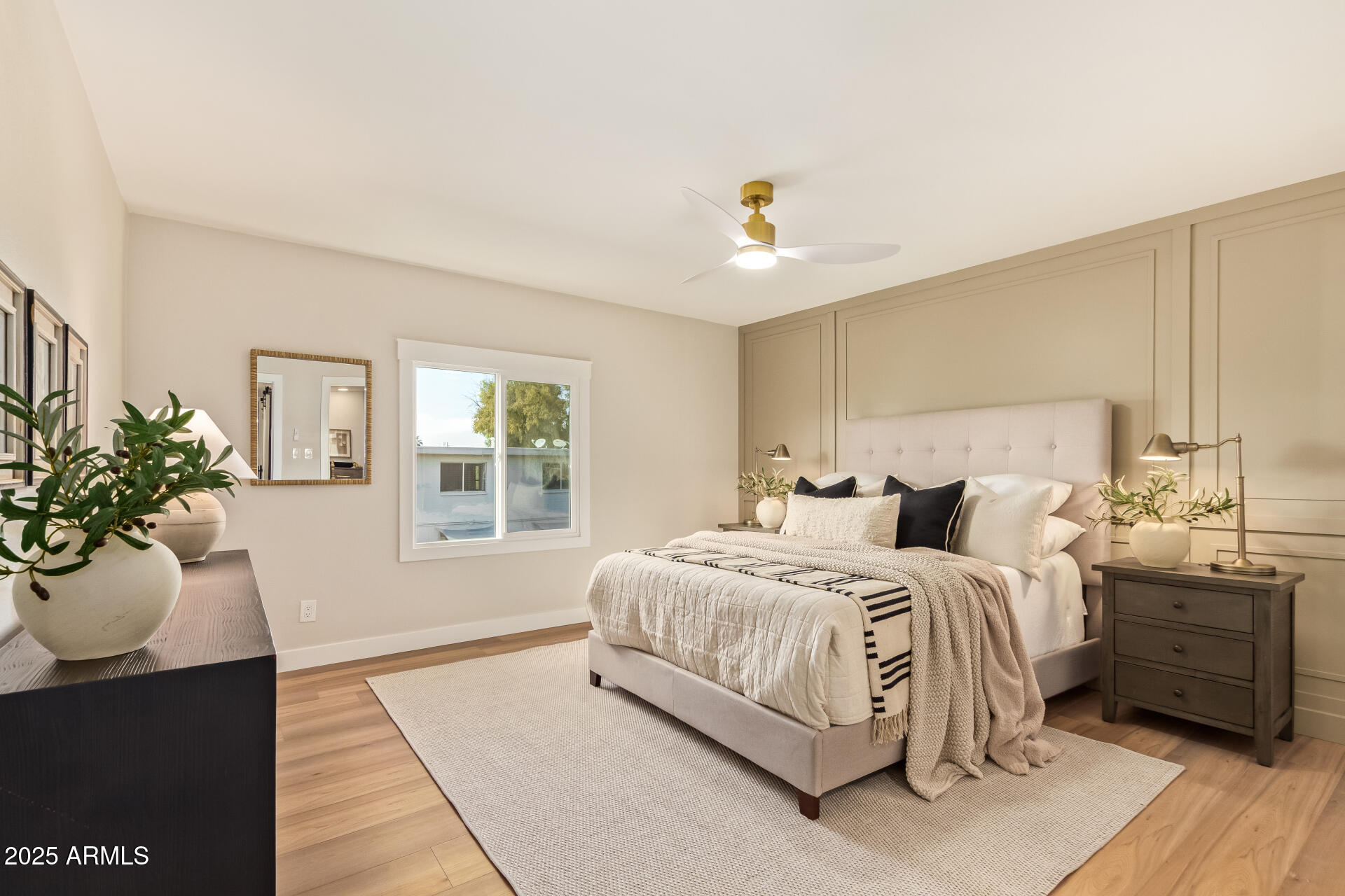 4201 East Camelback Road, Unit 14 Phoenix, AZ 85018 - Photo 12 of 26 a bedroom with bed and window