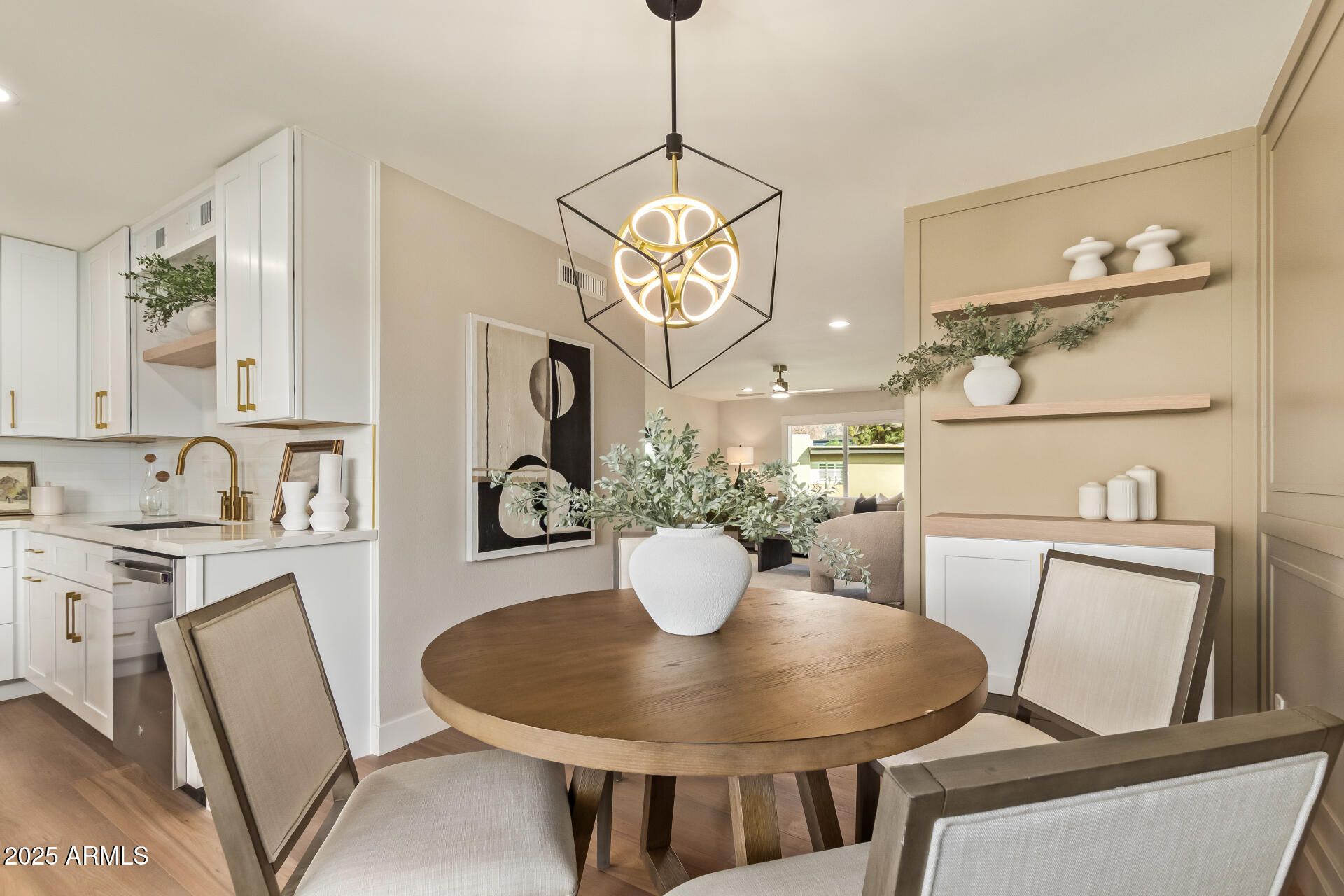 4201 East Camelback Road, Unit 14 Phoenix, AZ 85018 - Photo 7 of 26 a dining room with furniture and view of kitchen