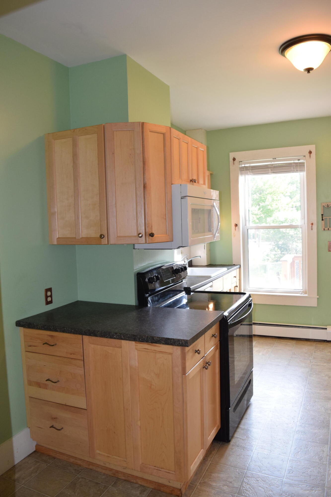 114 Rochester Street, Unit 114 Westbrook, ME 04092 - Photo 6 of 32 side view kitchen