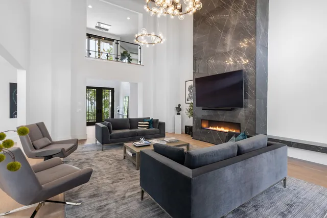 a kitchen with a sink a washer and dryer next to a window