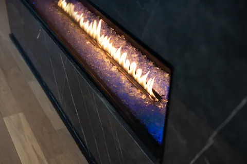 a bedroom with a bed and a mirror