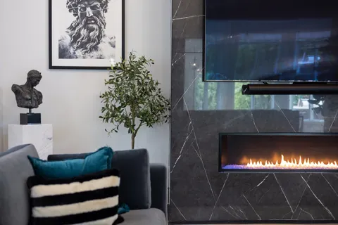 a bed room with a bed and a large window