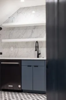 a front view of a house with garage