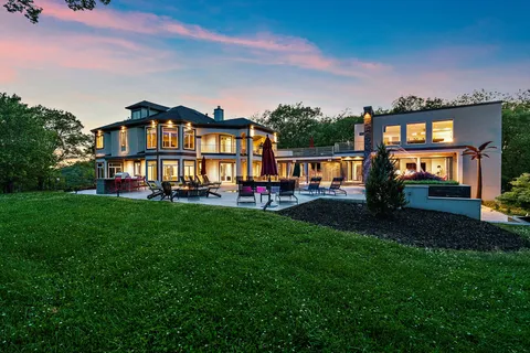 a kitchen with a sink a counter and a refrigerator