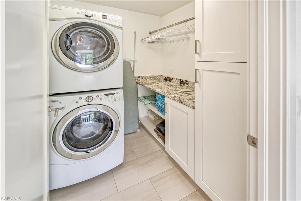159 Conners Avenue Naples, FL 34108 - Photo 31 of 35 a utility room with dryer and washer