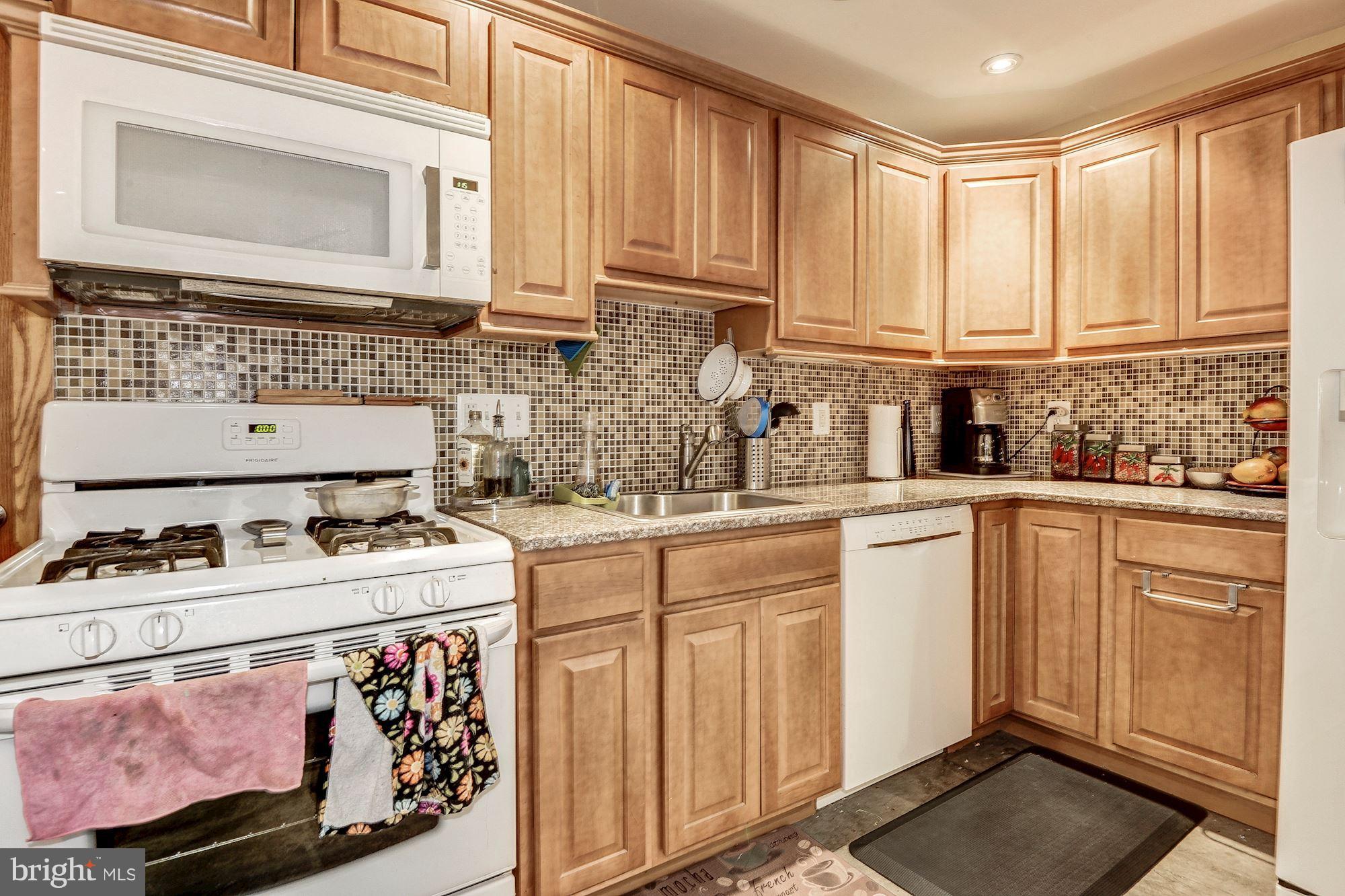 1933 Park Road Northwest Washington, DC 20010 - Photo 15 of 29 Kitchen of lower level; note gas cooking