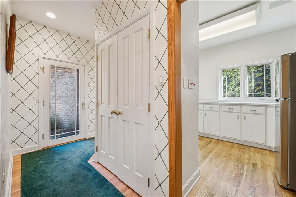 255 East William Street Indiana, PA 15701 - Photo 18 of 49 Hallway to garage, laundry area and additional half bath