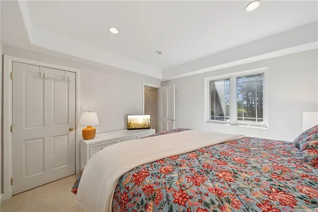 a bathroom with a sink a mirror and a shower