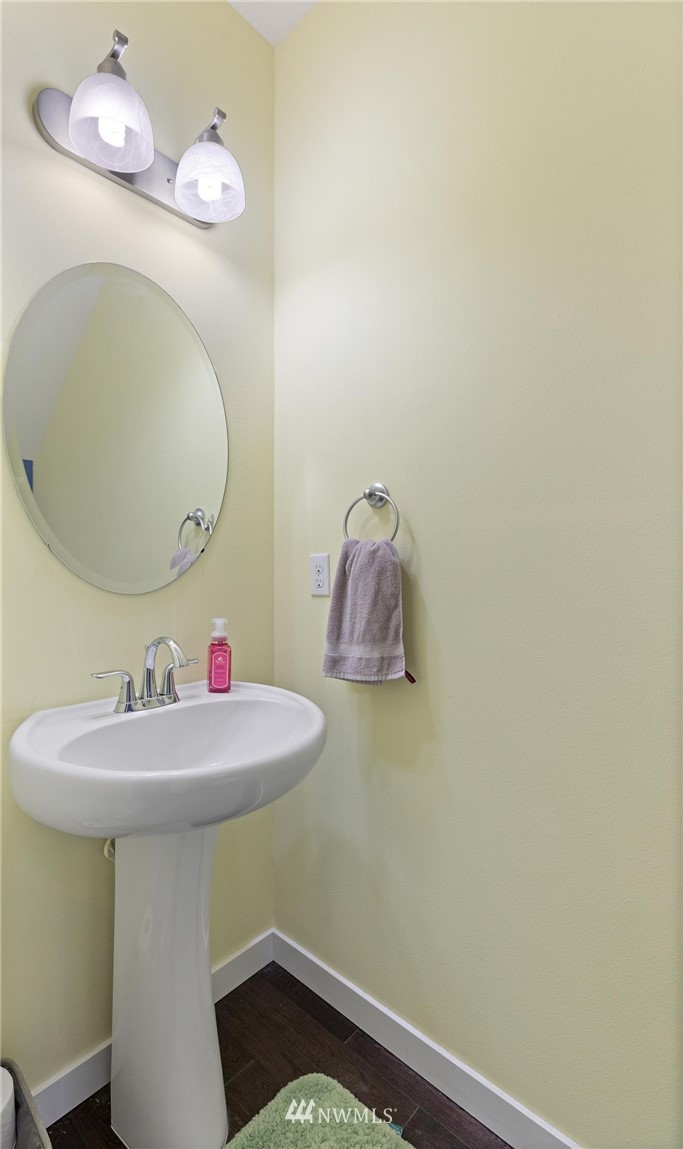 111 164th Place Southeast Bothell, WA 98012 - Photo 14 of 27 a bathroom with a sink and a mirror
