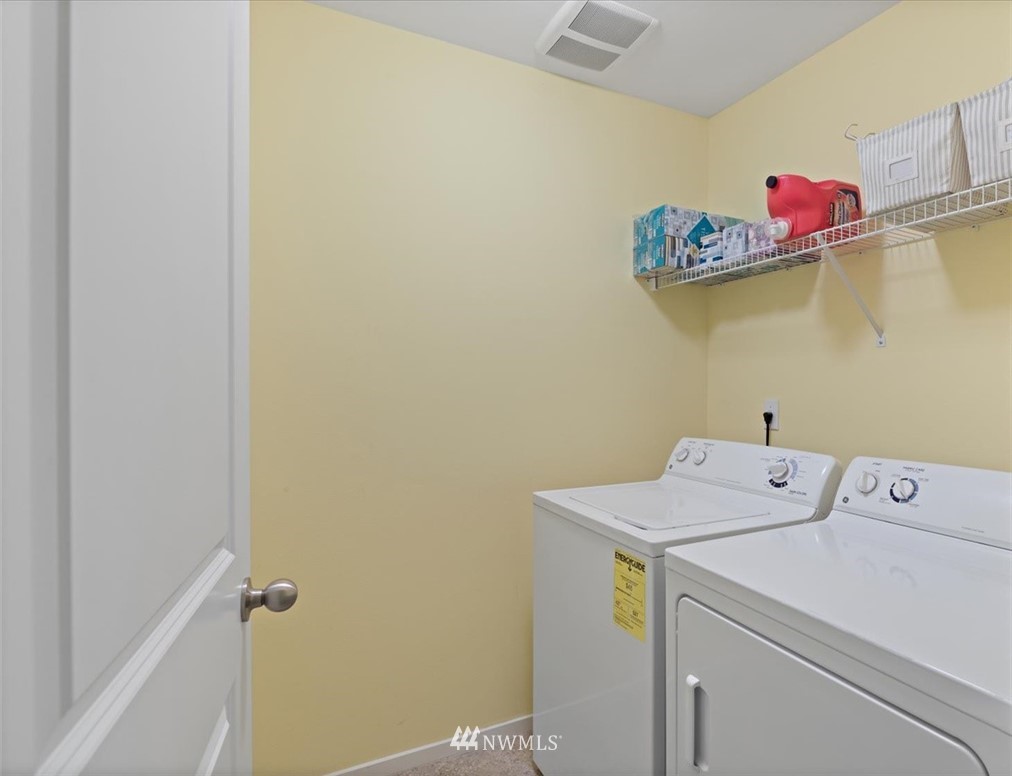 111 164th Place Southeast Bothell, WA 98012 - Photo 22 of 27 a utility room with dryer and washer