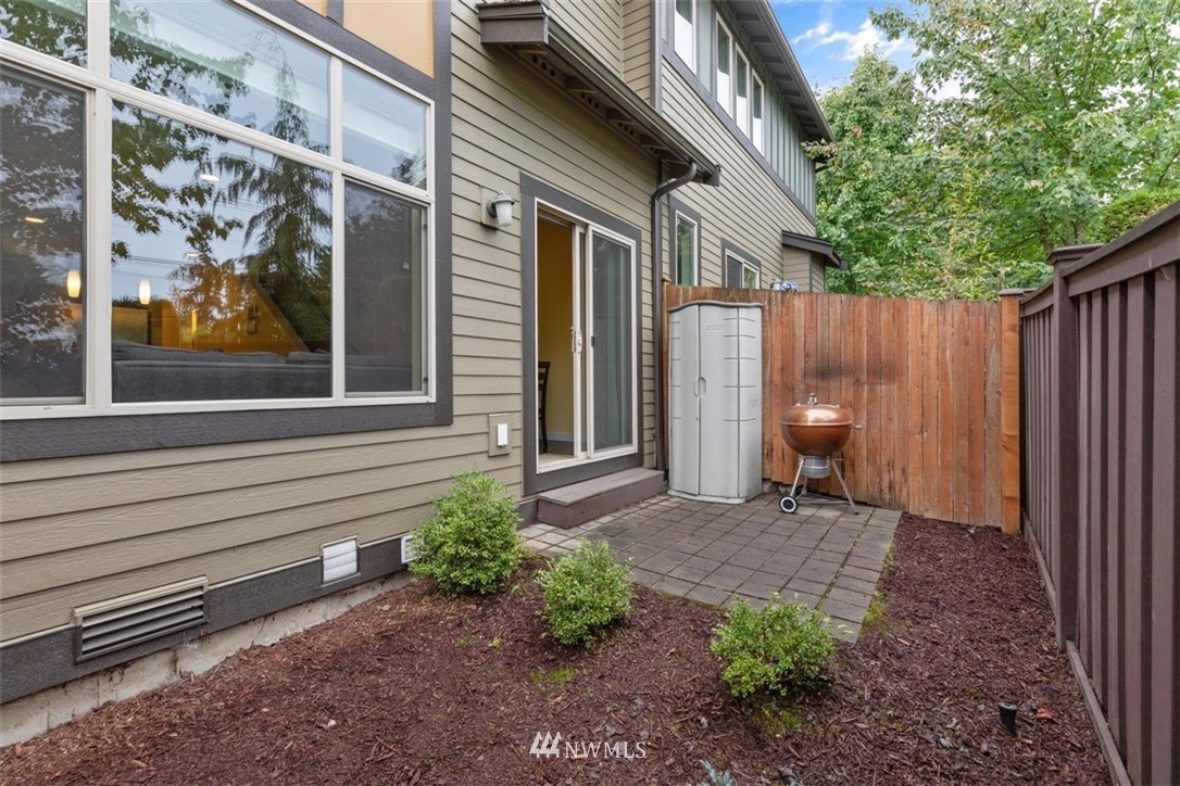 111 164th Place Southeast Bothell, WA 98012 - Photo 24 of 27 a view of a backyard with a chair and table