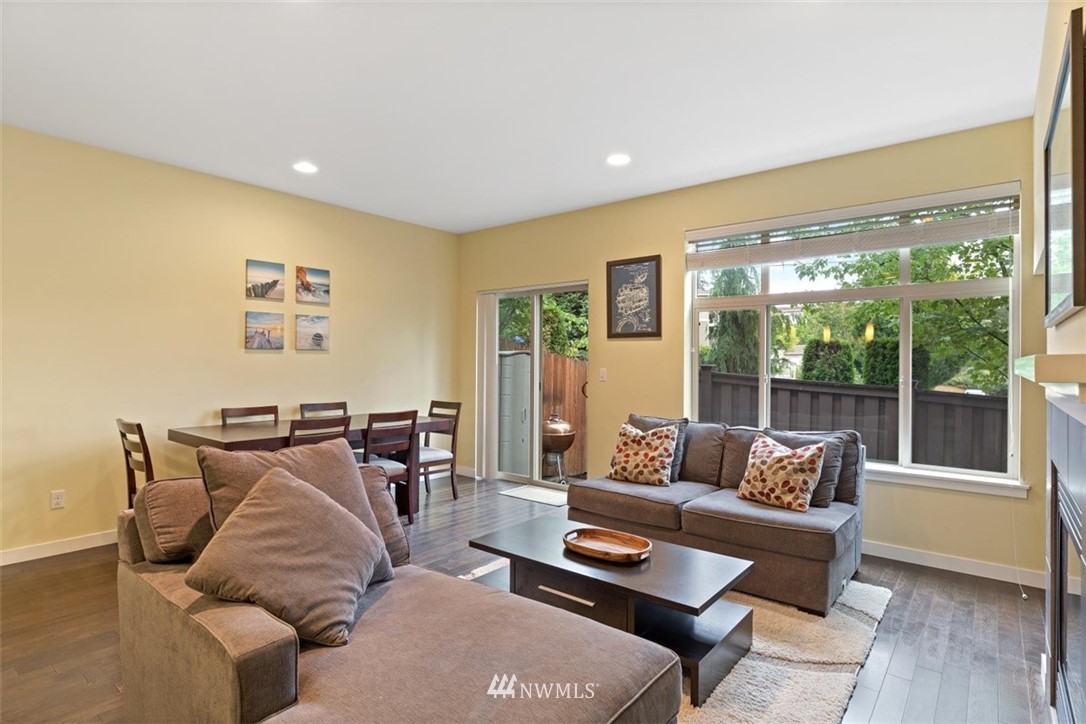 111 164th Place Southeast Bothell, WA 98012 - Photo 9 of 27 a living room with furniture and a large window