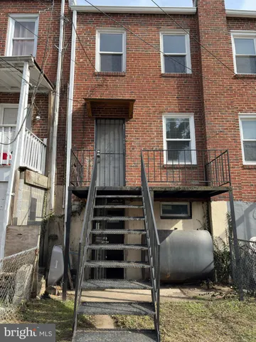 a front view of a house with street