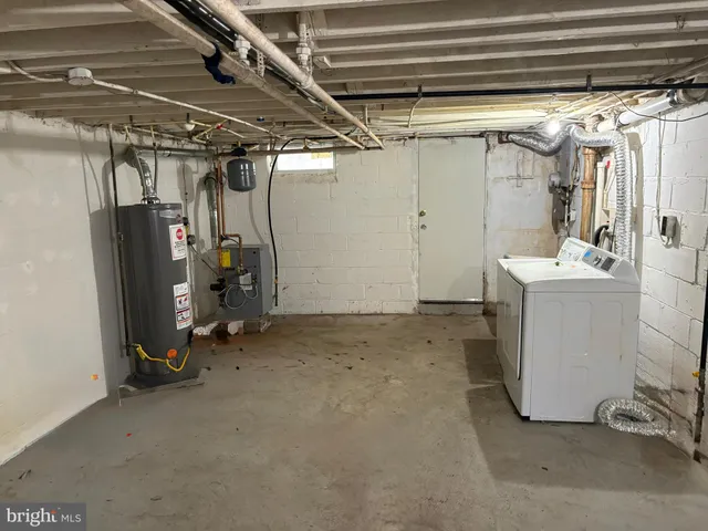 a view of a storage room with utility room