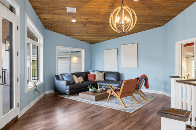 1263 Chapman Court Alpine, UT 84004 - Photo 73 of 83 Living room featuring a vaulted wood ceiling, dark wood-type flooring, and hanging lights