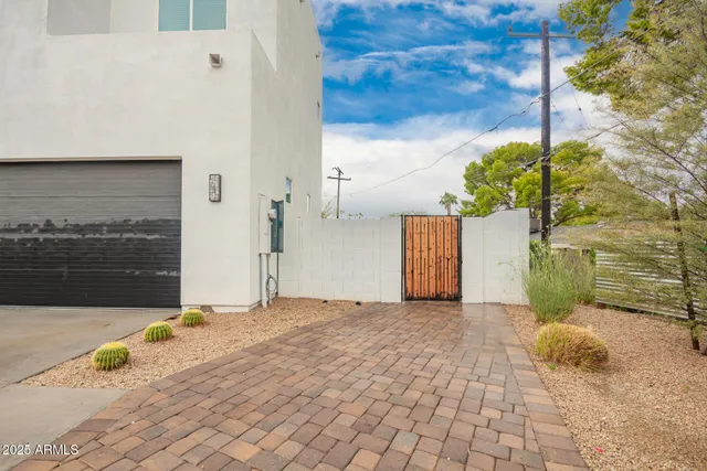 a view of a backyard of the house