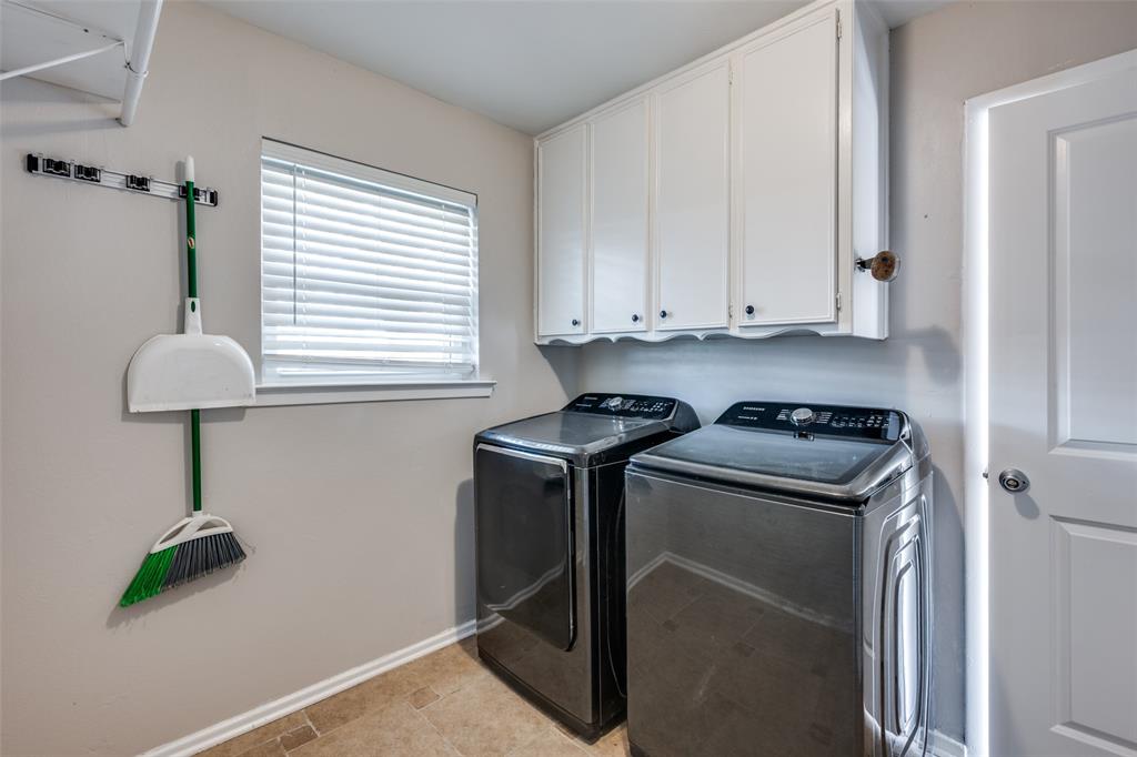 1428 Pamela Street Hurst, TX 76053 - Photo 21 of 25 a utility room with dryer and washer
